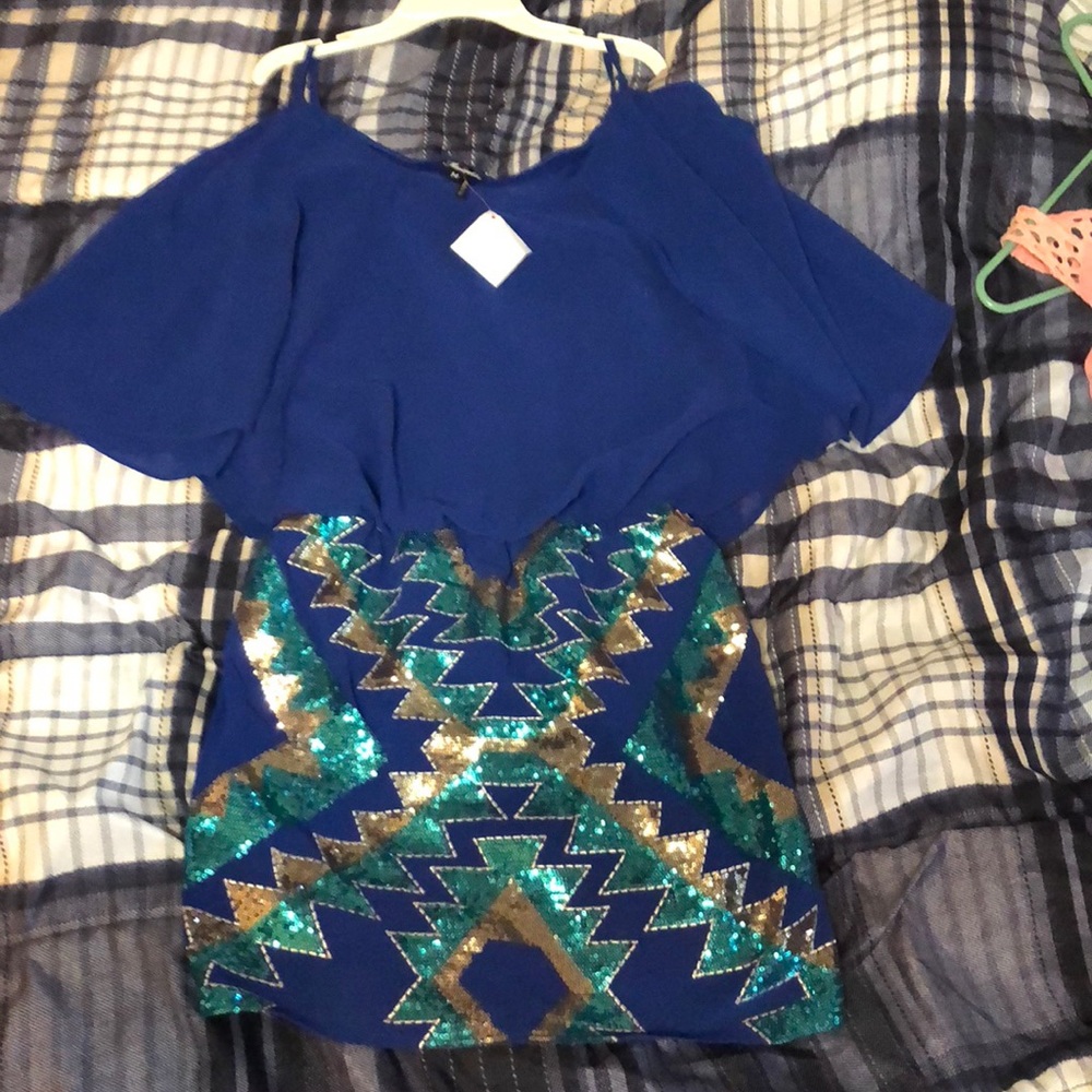 Royal blue sparkly dress.